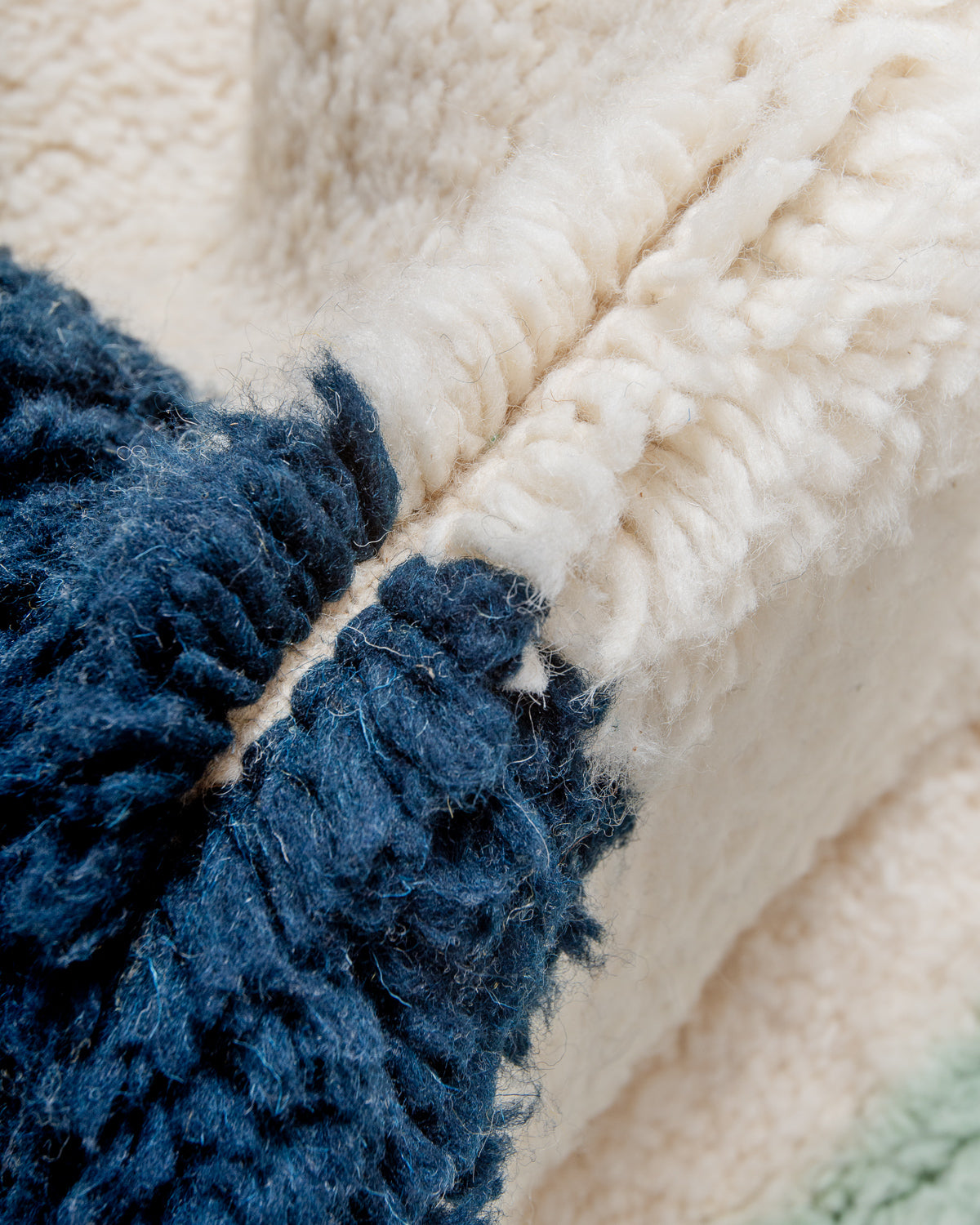 Modern, designer, handcrafted Berber rug from Morocco. Beniourain carpet with beautiful colours and patterns and fluffy wool texture.